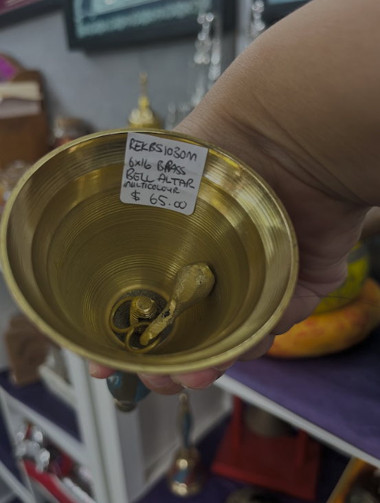 Brass bell altar in multicolour
